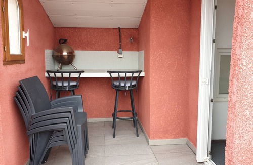 Roques Apartment | https:/redhouse-studios.com/Studio apartment with a sun deck overlooking the Pyrenees